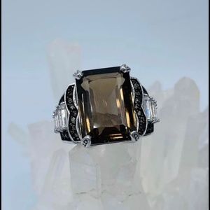 NEW 12.71CTW EMERALD CUT AND ROUND BRAZILIAN SMOKY QUARTZ.